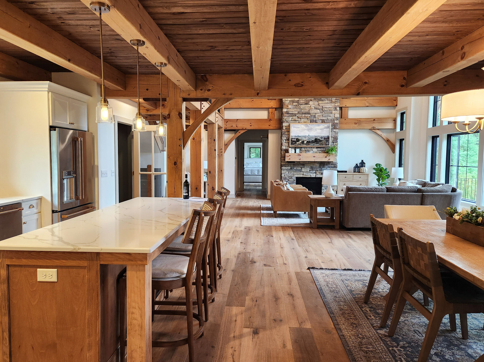 A well-decorated <a href="https://www.timberbuilt.com/timber-frame-home-designs/olive/" target="_blank" rel="noopener noreferrer">Olive</a> in <a href="https://www.timberbuilt.com/blog/olive-east-aurora-ny/" target="_blank" rel="noopener noreferrer">East Aurora, NY</a>.