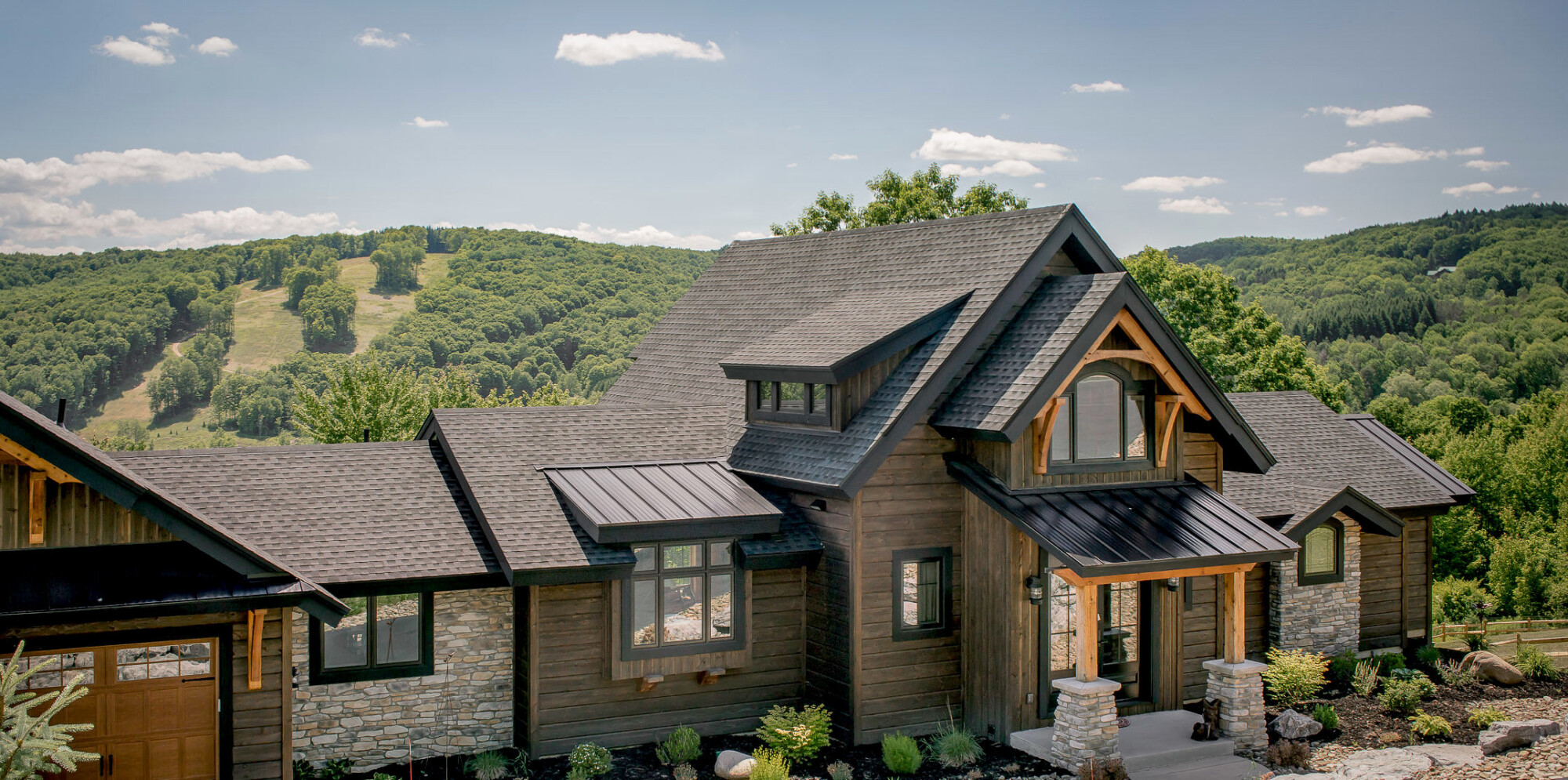 Front Entry <a href="https://www.timberbuilt.com/timber-frame-home-designs/olive/" target="_blank" rel="noopener noreferrer">Olive</a>.