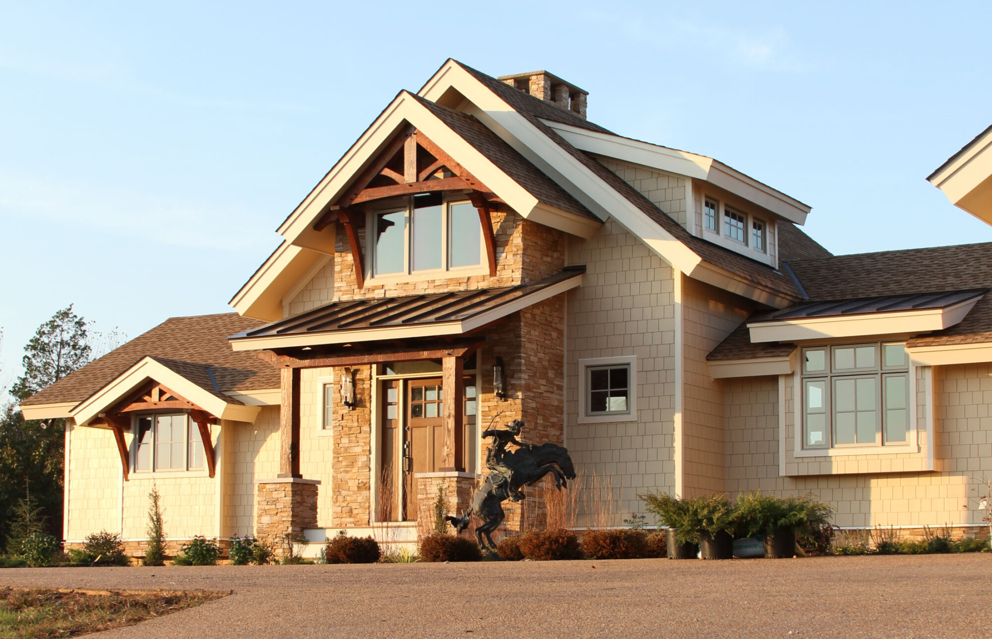 Front Entry <a href="https://www.timberbuilt.com/timber-frame-home-designs/olive/" target="_blank" rel="noopener noreferrer">Olive</a>.